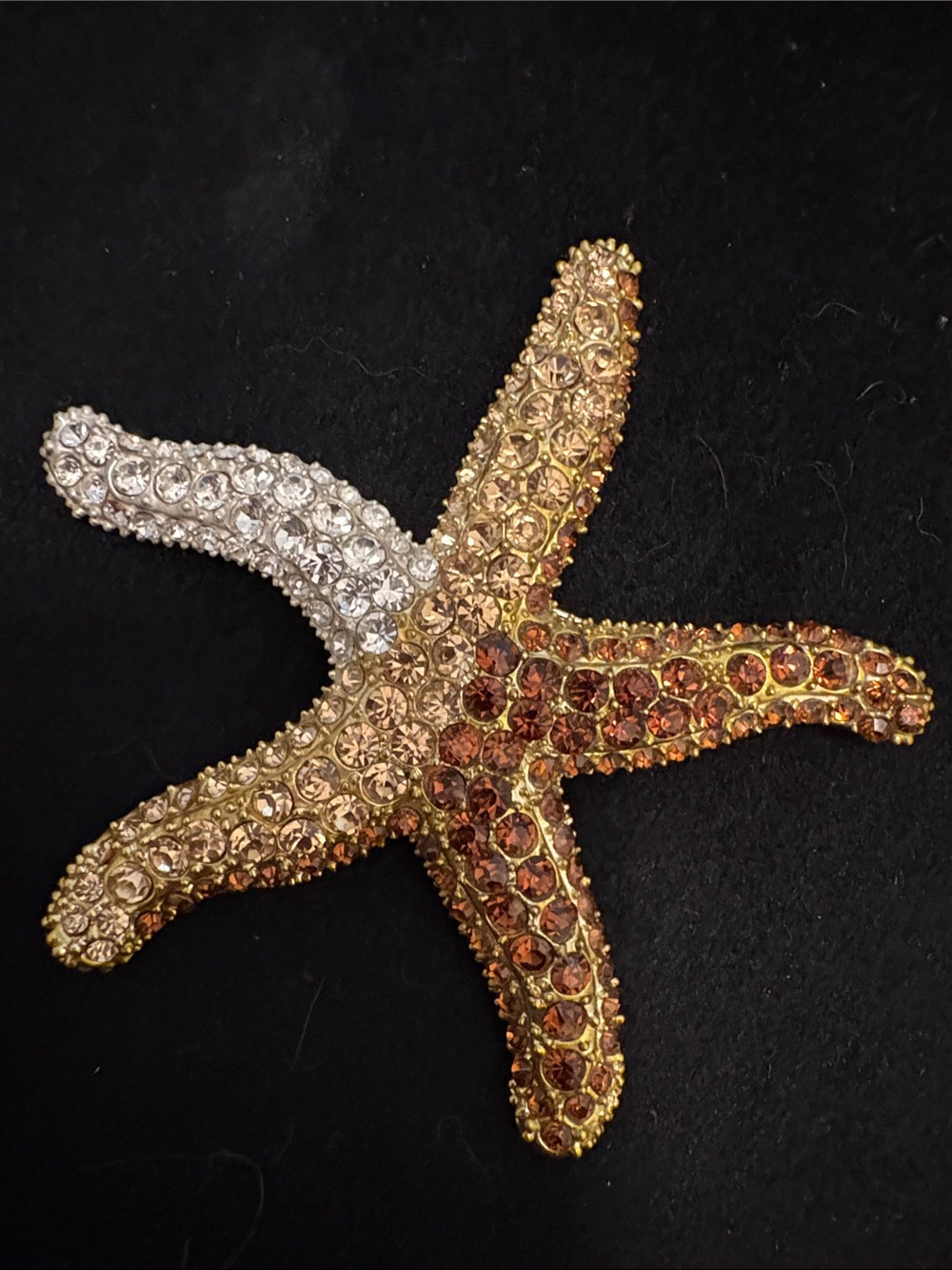 Large Vintage rhinestone starfish brooch. with Swarovski crystals in gold tone